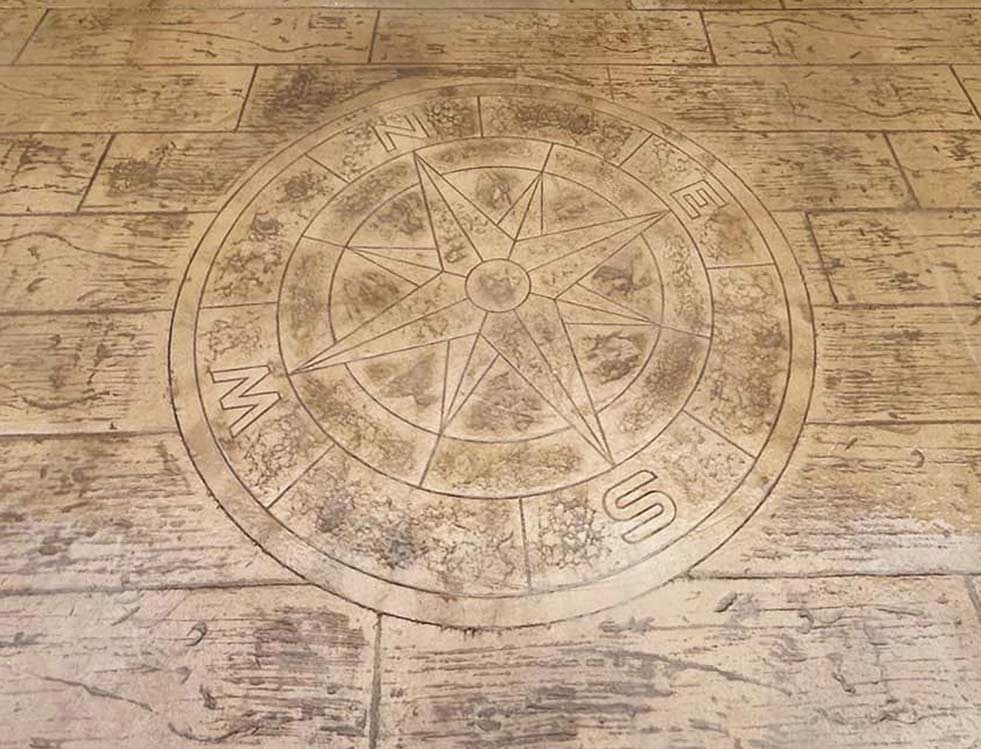 Une rose des vents en béton imprimé
